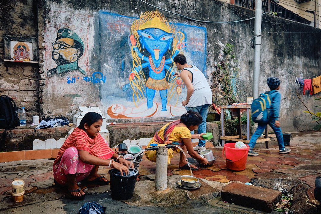 Wall Painting Women Working Water Kolkata India Street Documentary Kali BTS Graphic Color Contrast