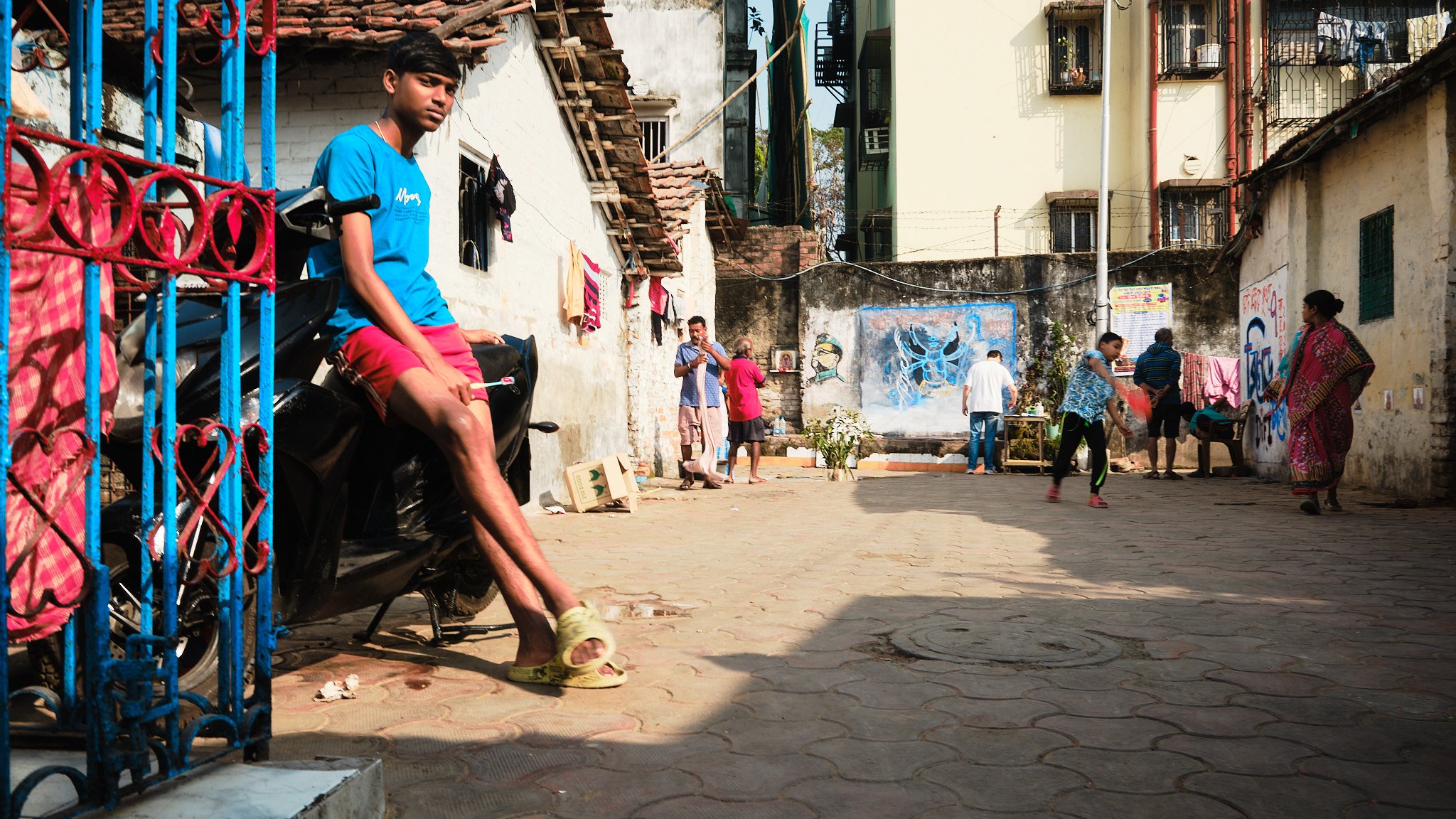 Wall Painting Painter Process Boy Portrait Kolkata India Street Documentary Kali BTS Graphic Color Contrast