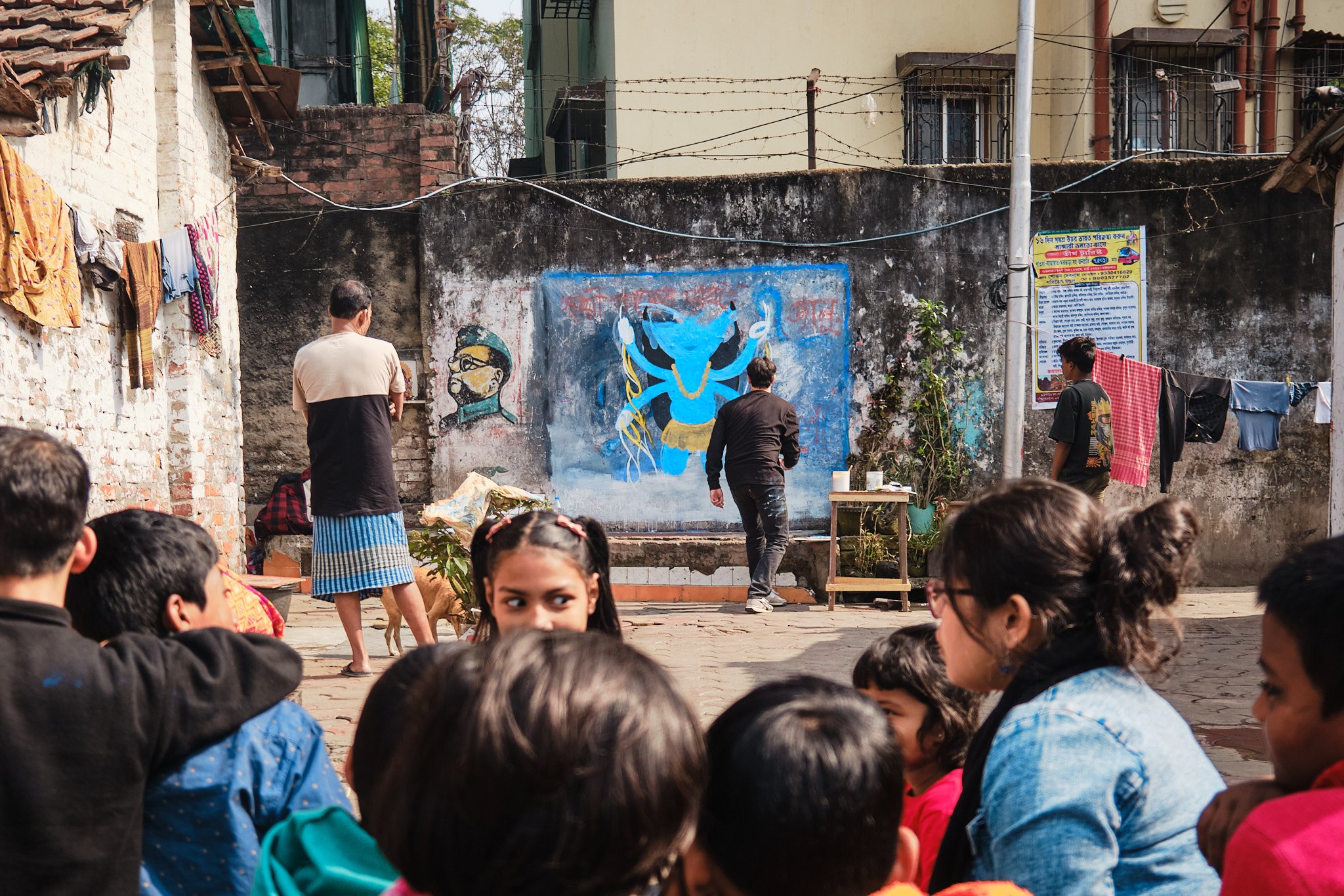 Wall Painting Painter Process Group Portrait Eyes Girl Kolkata India Street Documentary Kali BTS Graphic