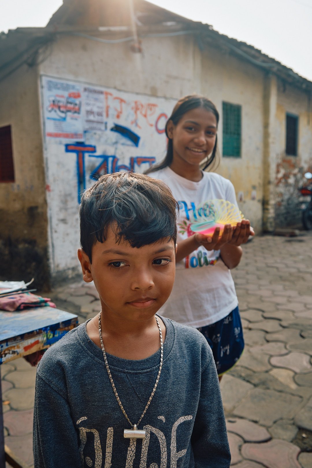 Kolkata India Children Street Documentary Street Boy Portrait Backlit Girl Slinky